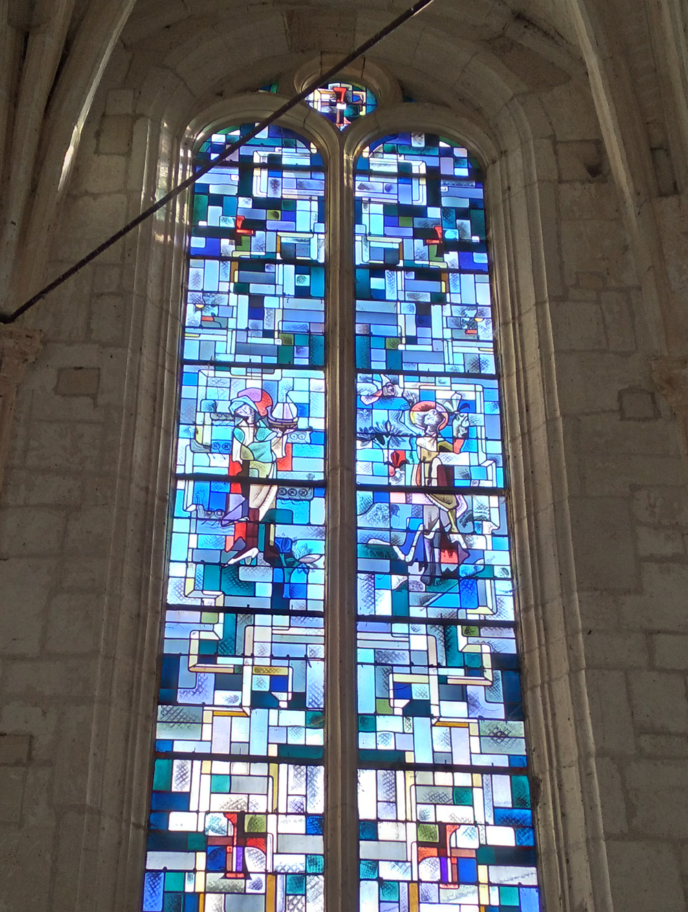 Le vitrail dédié à Sainte-Geneviève, dans l'église Saint-Mansuy de Culey (Meuse).